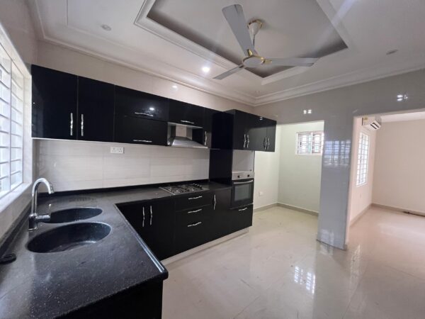 Sleek kitchen design with ample storage and preparation space.