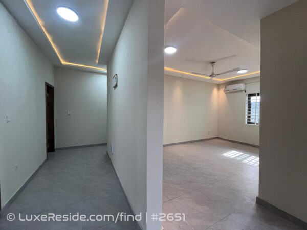 Bright interiors showing the hallway connection and room entrance.