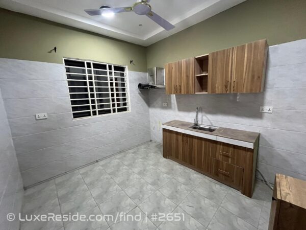 Kitchen details including window security and layout.
