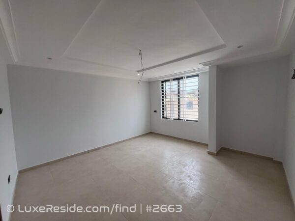 Bright and clean bedroom space ready for furnishing.