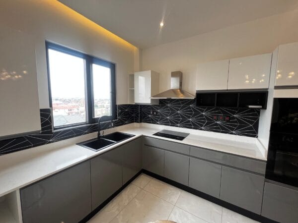 Fully furnished kitchen with premium appliances for a contemporary cooking experience.
