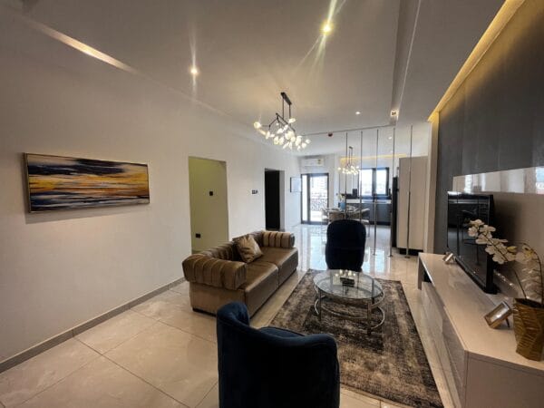 Stylish open-plan living room designed for comfort and relaxation.