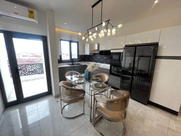Bright and airy dining area, perfect for family meals or entertaining guests.