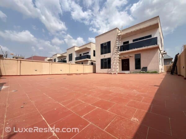 Spacious self-compound with a secure gate and ample parking.