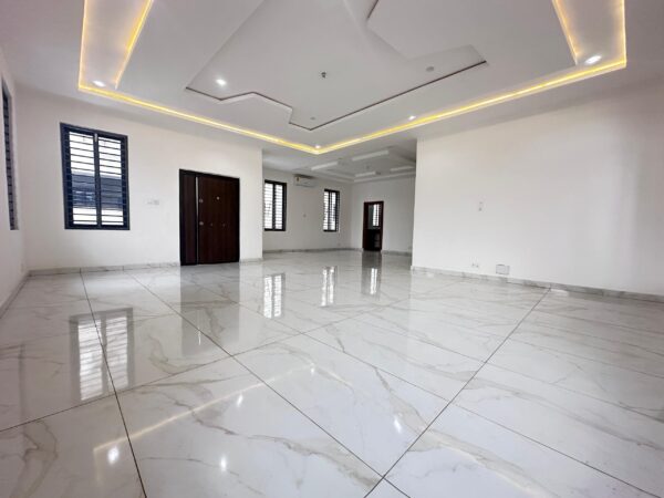 Expansive living area with high ceilings and modern finishes.