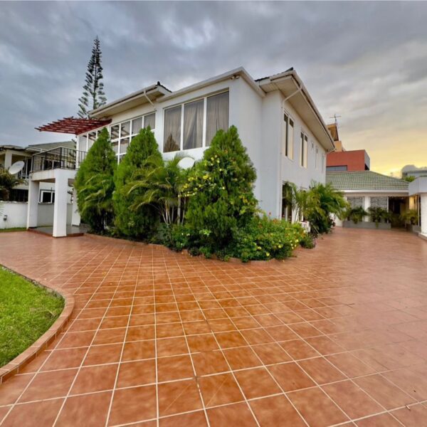 featured image of the Ultra-Modern 5-Bedroom House with Boys’ Quarters & Outdoor Bar for Sale in AU Village, Cantonments