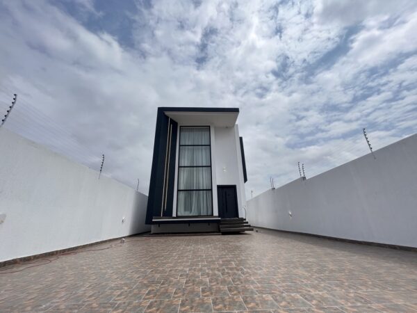 Unique minimalist and contemporary design with floor-to-ceiling windows and a private courtyard