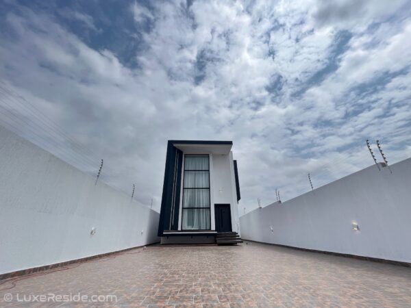 Unique minimalist and contemporary design with floor-to-ceiling windows and a private courtyard