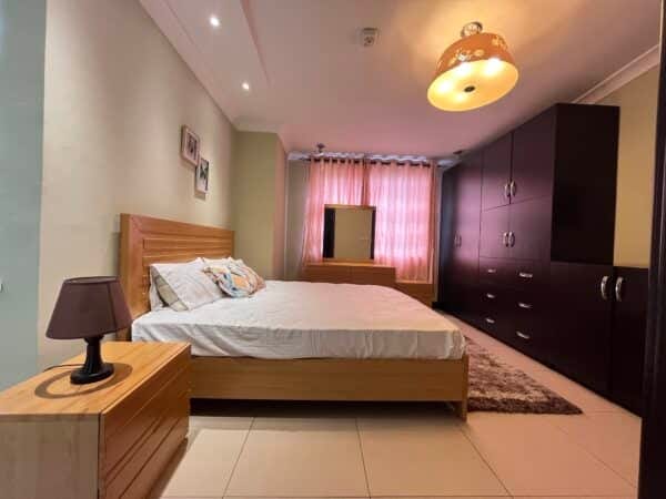 Secondary bedroom offering modern comfort and plenty of storage.