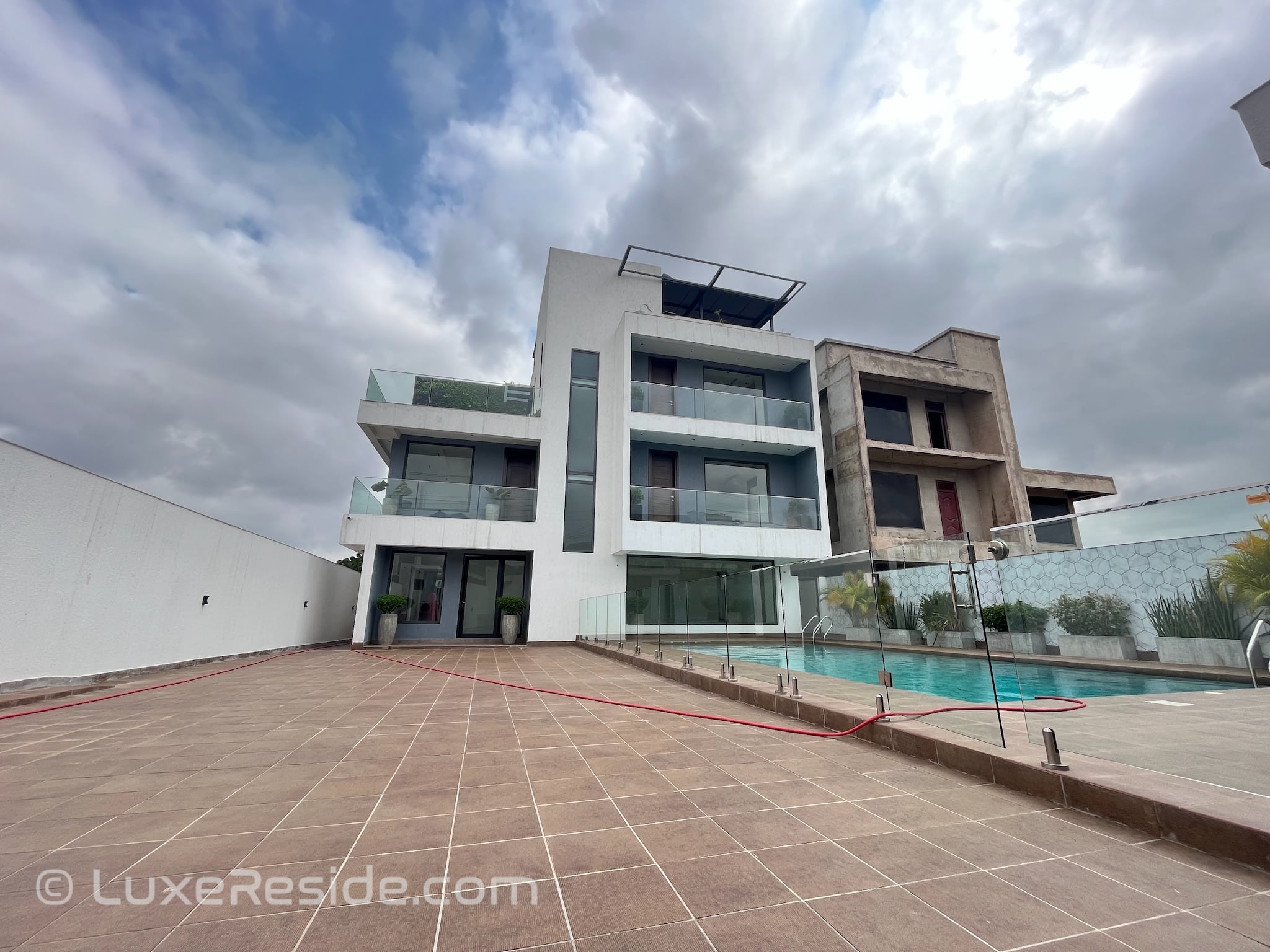 Featured image for the Luxurious 5-Bedroom Home w/ Boys Quarters and Pool For Sale at Adjiringanor