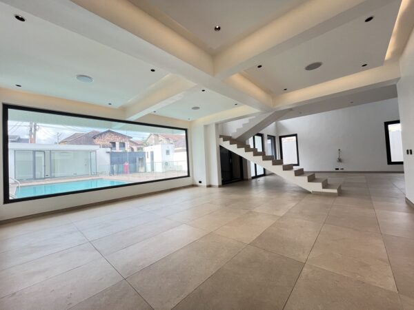 Spacious living area with an open floor plan and modern finishes.