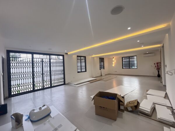 Bright living space with secure sliding doors and natural light.
