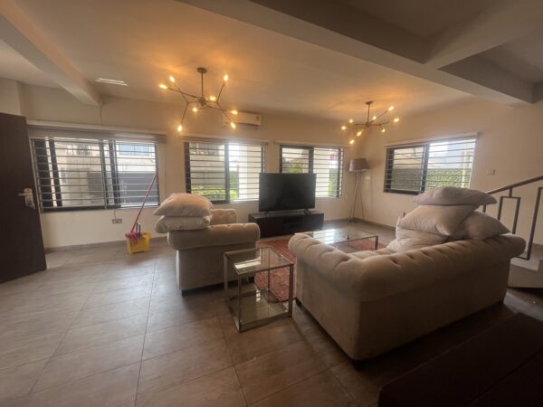 Comfortable living room with cozy seating and a stylish ambiance.
