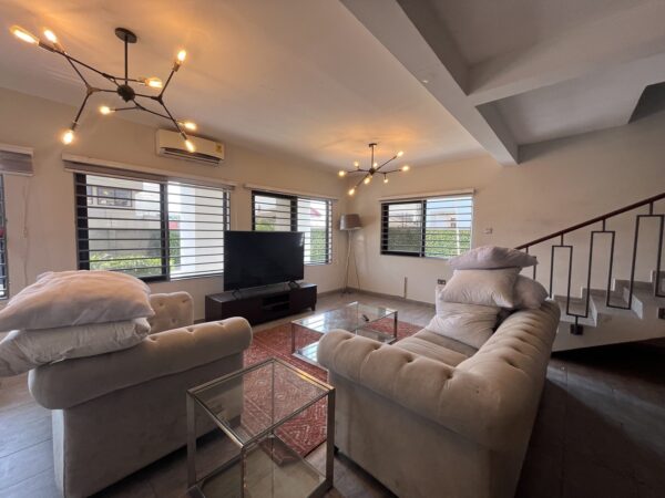 Comfortable living room with cozy seating and a stylish ambiance.