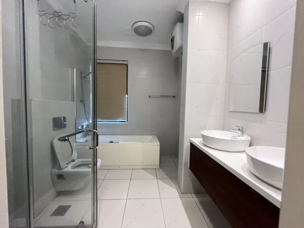 Unwind in your luxurious en-suite, complete with a soaking tub.