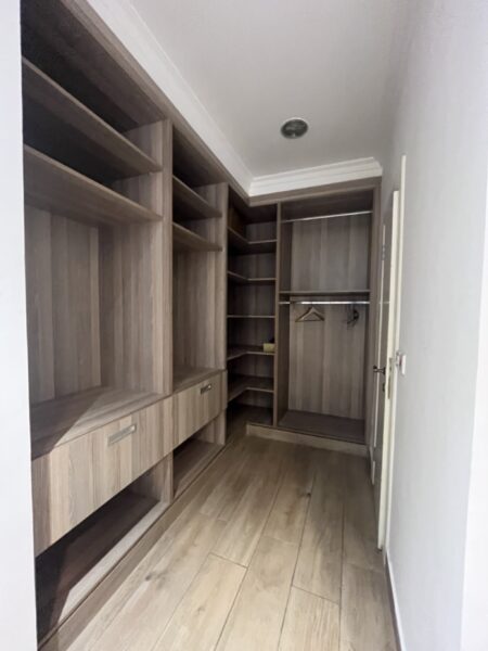 Organized and ample walk-in closet space for all your belongings.
