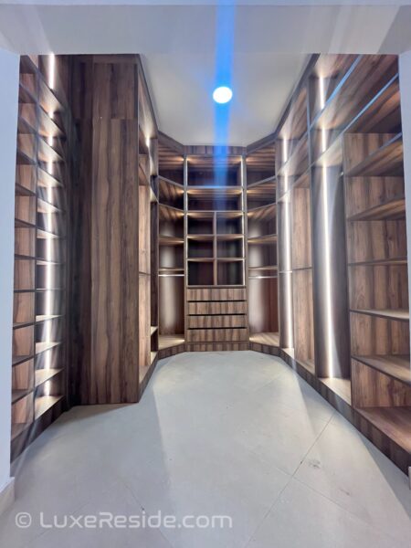 Your dream walk-in closet awaits—elegant, spacious, and functional